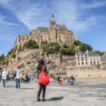 From Paris: Full-Day Mont Saint-Michel Guided Tour - Visiting the Mont Saint-Michel Abbey: Gothic Masterpiece