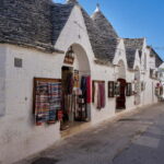 From Polignano a Mare: Alberobello Guided Tour - Exploring Alberobello’s Trulli District: Rione Monti and Aia Piccola