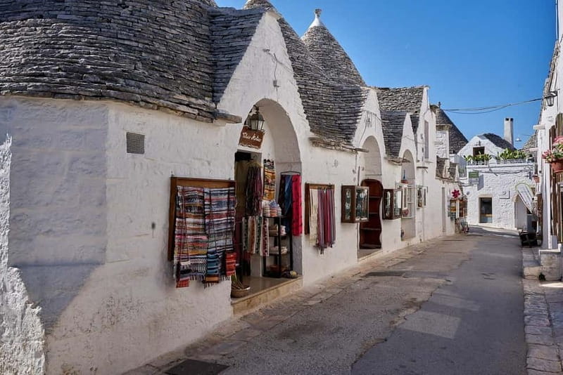 From Polignano a Mare: Alberobello Guided Tour - Exploring Alberobello’s Trulli District: Rione Monti and Aia Piccola