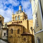 From Porto: Coimbra, Aveiro and Costa Nova Day Tour - Discovering Coimbra’s Religious Heritage at Sé Velha