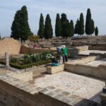 From Seville: Italica Roman City & Medieval Monastery Tour - Exploring the Roman Amphitheater