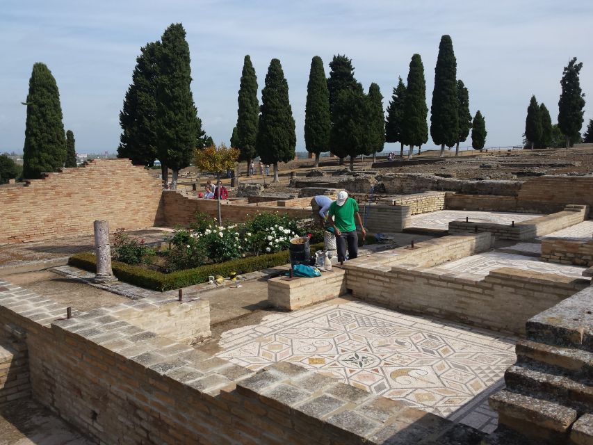 From Seville: Italica Roman City & Medieval Monastery Tour - Exploring the Roman Amphitheater
