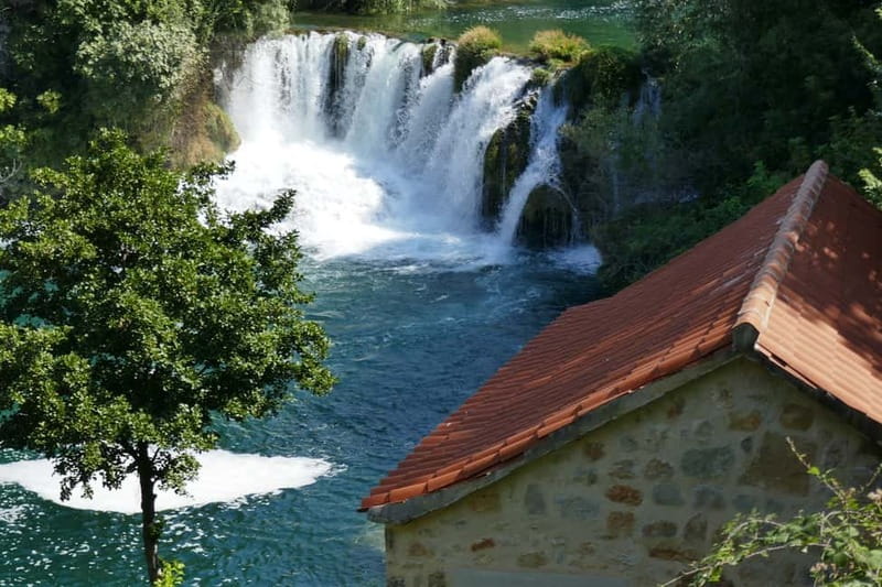 From Split: Krka Waterfalls with Riverboat Ride & swimm stop - The Krka Waterfalls and Canyon: Nature’s Spectacle
