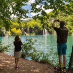 From Split: Plitvice Lakes Fully-Guided Day Tour - Crossing to the Lower Lakes: Limestone Dams and Veliki Slap