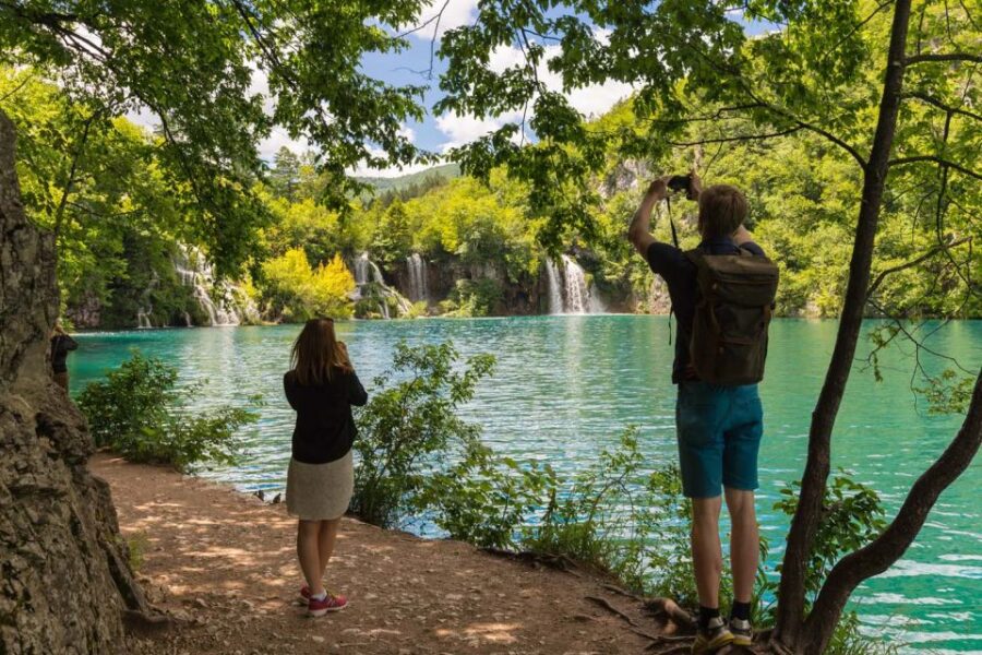 From Split: Plitvice Lakes Fully-Guided Day Tour - Crossing to the Lower Lakes: Limestone Dams and Veliki Slap