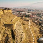 From Tbilisi: Mtskheta, Jvari, Gori & Uplistsikhe Cave Tour - Visiting the Jvari Monastery on the Hilltop