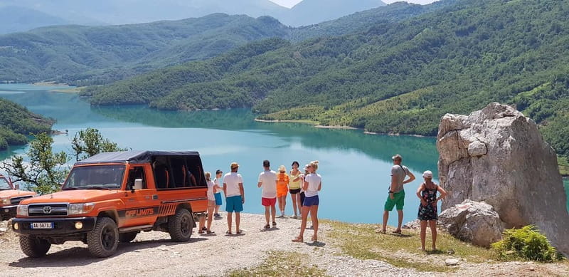 From Tirana: Open-Top 4WD Bovilla Lake Canyon & Gramti Mount - Riding in a Vibrant Orange Safari Jeep