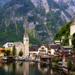 From Vienna: Day Tour to Hallstatt and Salzburg with Boat Ride - Scenic Boat Ride on Hallstättersee