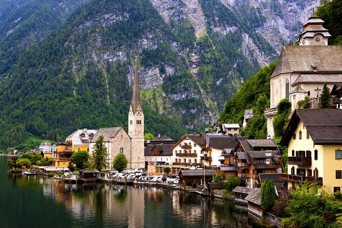 From Vienna: Day Tour to Hallstatt and Salzburg with Boat Ride - Scenic Boat Ride on Hallstättersee