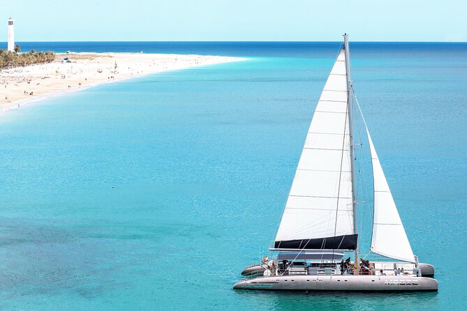 Fuerteventura: Magic Select Catamaran Trip with Food & Drinks - The Route: From Dolphins to Deserted Coves