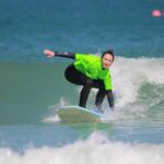 Full-Day (2 x 2 hr lessons) Surf Experience Newquay: All levels - Location: Surfing at Newquay’s Iconic Coastline