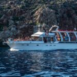 FULL DAY GROUP TOUR KOUTSOMITI KOUNOUPA & RED ROCK WITH MEAL - Visiting the Crimson Majesty: Red Rock Formation