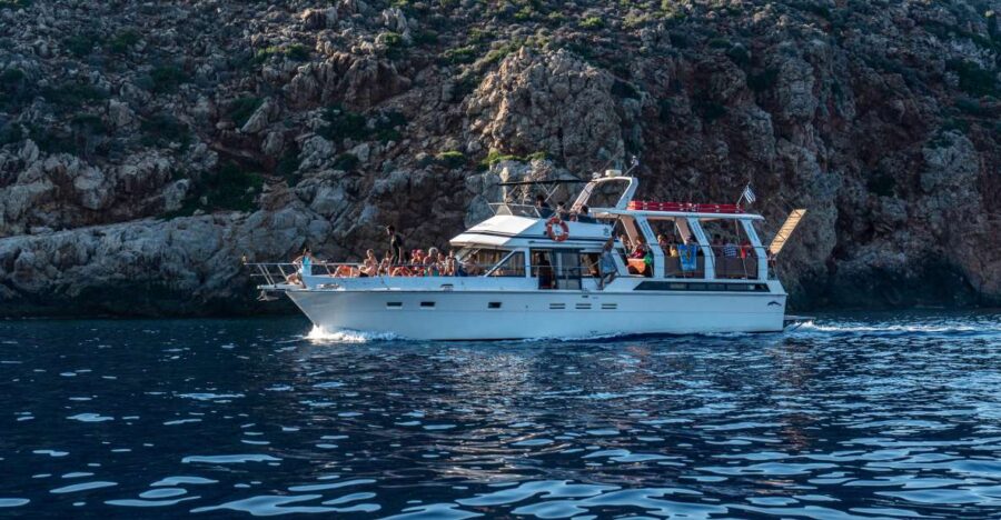 FULL DAY GROUP TOUR KOUTSOMITI KOUNOUPA & RED ROCK WITH MEAL - Visiting the Crimson Majesty: Red Rock Formation