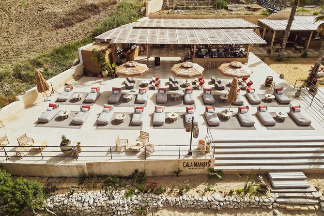 Full Day Pass to Cala Manbrù Beach Club - Location and Setting at Cala Manbrù Beach Club