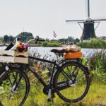Full-Day Trip From Amsterdam to Keukenhof, Zaanse Schans + Cruise - Starting Point and Overall Logistics