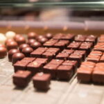 Geneva Chocolate Tour aboard a TukTuk - Starting Point at Place de Neuve in Geneva