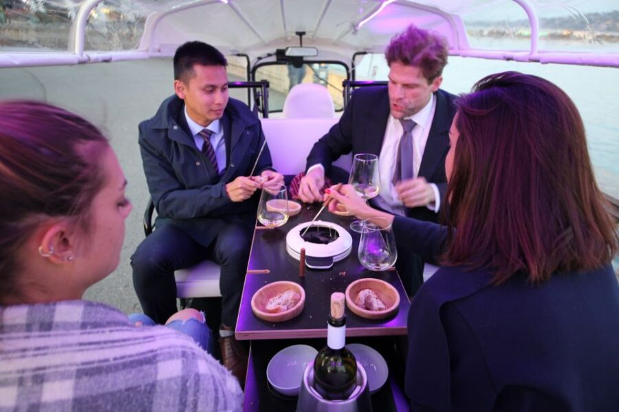 Geneva: tour with fondue and wine in TukTuk - Meet Your Guide at Place de Neuve in Geneva