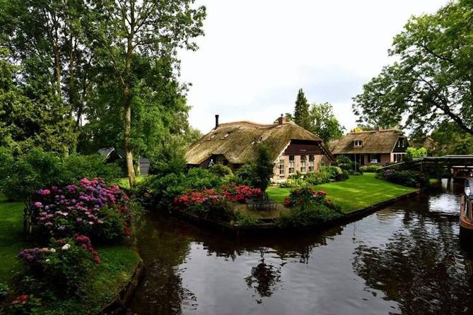 Giethoorn and Zaanse Schans Day Tour with Small Boat Ride - The Cheese, Clogs, and Diamond Factories