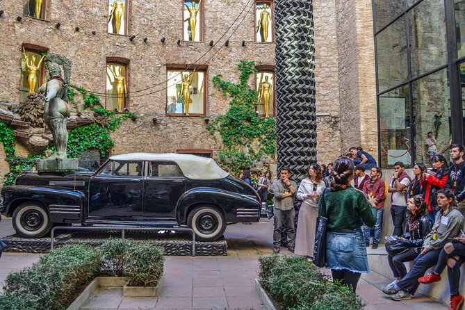 Girona Guided Tour & Dali Museum from Barcelona - Walking Along Gironas Fortified Walls and Scenic Views