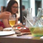 Girona: History and Gastronomy Small Group with Tastings - Crossing the Onyar River via The Eiffel Bridge