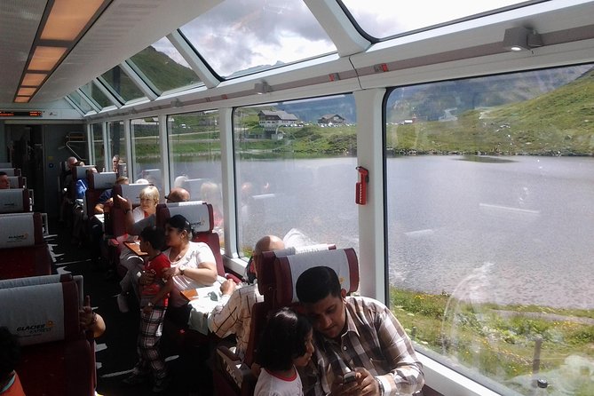 Glacier Express Panoramic Train Round Trip in one Day Private Tour from Basel - The Glacier Express: Traveling Through the Swiss Alps