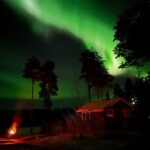 Glass Igloo Campfire Dinner under Northern Lights - Delicious Fire-Cooked Lapland Cuisine