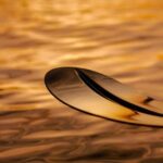 Golfo Aranci: traditional or transparent kayaks, dolphins, and aperitifs - Starting Point at Baracconi Beach