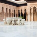 Granada: Alhambra and Nasrid Palaces Small Guided Tour - Exploring the Alhambra Fortress and Its Historic Walls