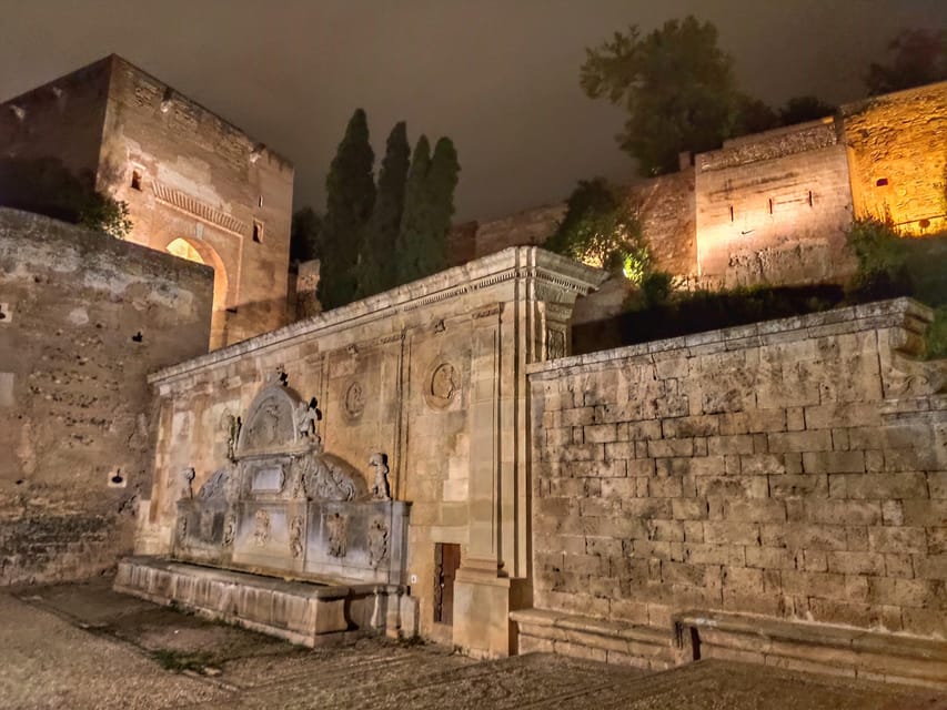 Granada: Sunset Legends of the Alhambra Guided Tour - Exploring the Alhambra Surroundings at Sunset