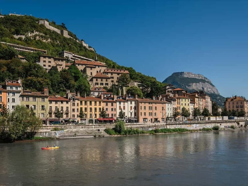 Grenoble: 2-hour Best Intro Walking Tour with a Local - Exploring Iconic Landmarks: Jardin de Ville and Le Pont Saint-Laurent