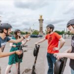 Guided Electric Scooter Tour of Paris - Visiting the Louvre Palace and Museum on Scooters