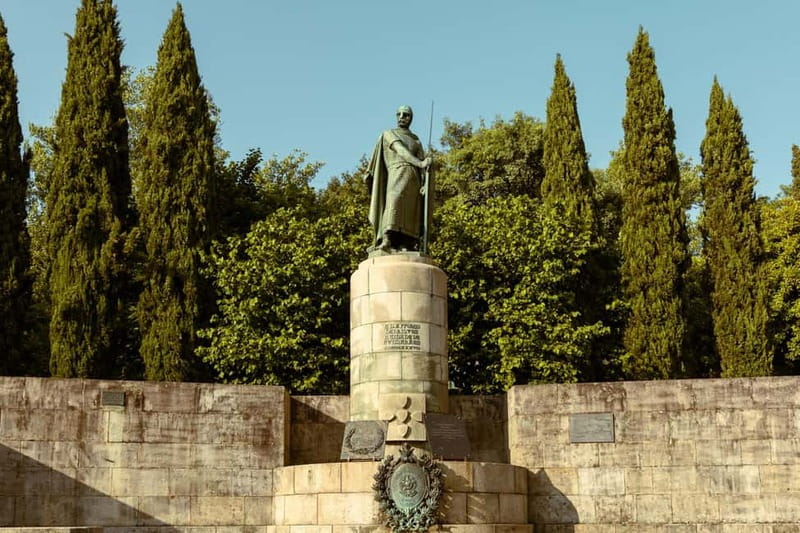 Guimarães: Highlights and Hidden Gems Walking Tour - Walking Along the Old City Walls and the Significance of Guimarães Walls