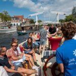 Haarlem Open Canal Tour with a real live guide - The Open Sloop: A Unique Watercraft Choice