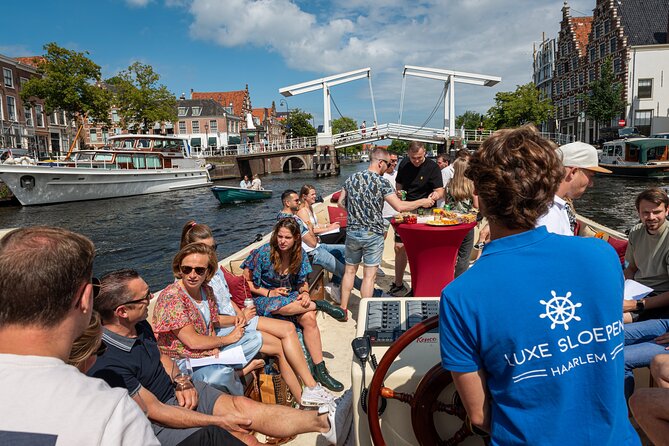 Haarlem Open Canal Tour with a real live guide - The Open Sloop: A Unique Watercraft Choice