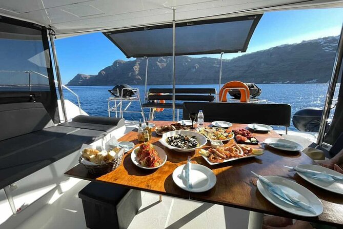 Half Day Premium Catamaran Cruise in Santorini including Oia - Swimming and Snorkeling at the Santorini Volcano Hot Springs