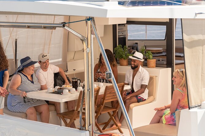Hersonissos: Sunset Catamaran Cruise with Snacks and Drinks - Onboard Amenities and Equipment
