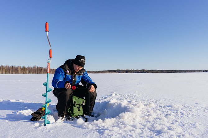 Ice Fishing Like a Finn, Apukka Adventures Rovaniemi - The Ice Drilling and Fish Attracting Process