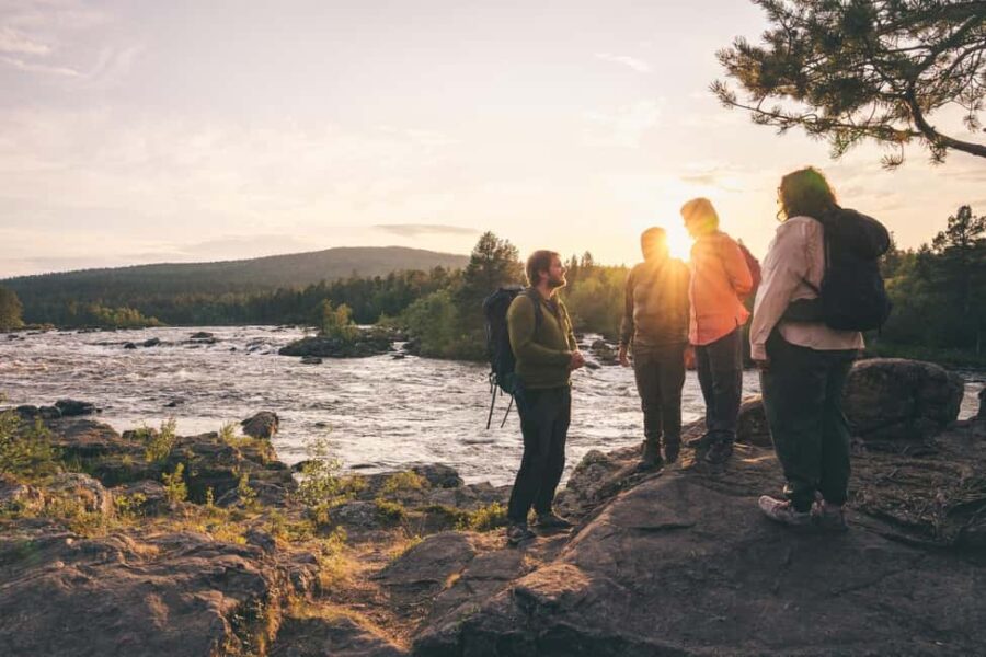 Inari: Midnight Sun Guided Hike with sparkling drinks - The Magic of the Midnight Sun in Lapland
