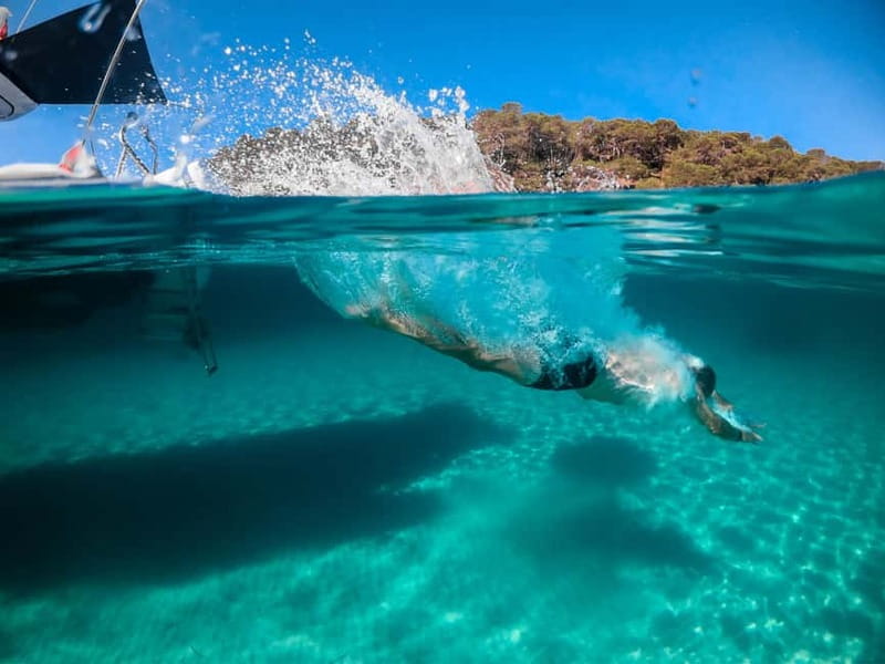 Island Hopping: Santorini to Ios - Exploring Ios: Secluded Beaches, Sightseeing, and Free Time