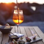 Italian aperitif at the sunset by the sea - What Makes This Aperitif Experience Special