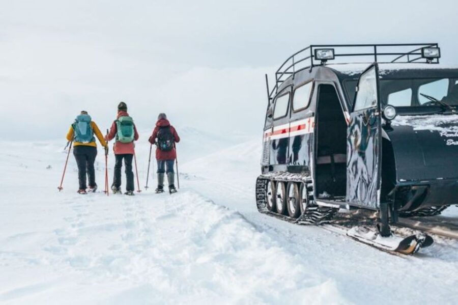 Jotunheimen: Snowcoach Tour with Snowhoeing and Lunch - Scenic Journey on the Historic Bombardier Snowcoach