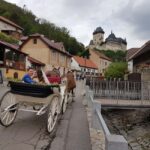 Karltejn castle by horse carriage - The Ride to Karltejn Castle: A Romantic Journey