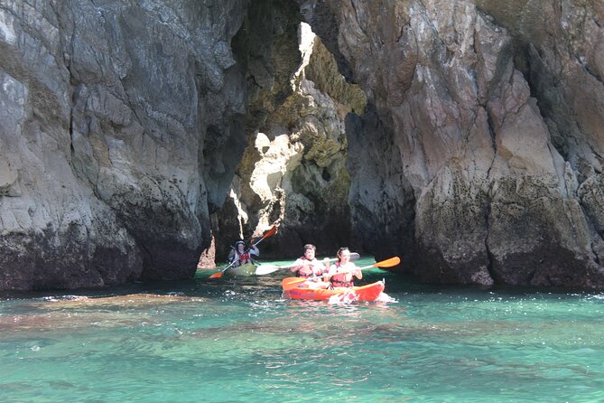 Kayak tour from Sesimbra to Ribeira do Cavalo Beach, passing through the caves - Paddle into the Caves and Tunnels of the Coast