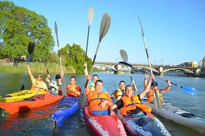 Kayak tour in Seville - Navigating Under the Triana Bridge and Past Torre del Oro