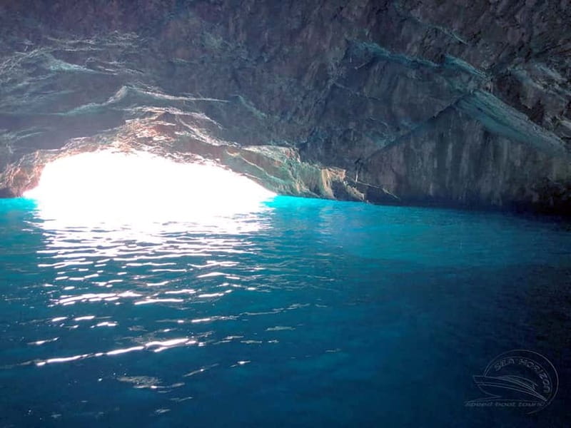 Kotor: Bay of Kotor and Blue Cave Speedboat Tour - Visiting the Blue Cave: Swimming in Turquoise Waters