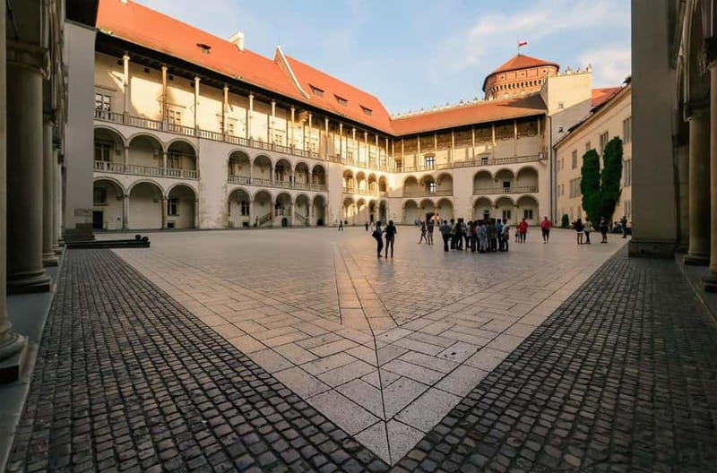 Krakow: Guided Wawel Tour, Lunch, and Vistula River Cruise - Inside Wawel’s Royal Rooms and Art Collections