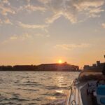 Lake Garda: Sunset Boat Ride from Sirmione - Scenic Views of the Grotte di Catullo and Scaliger Castle
