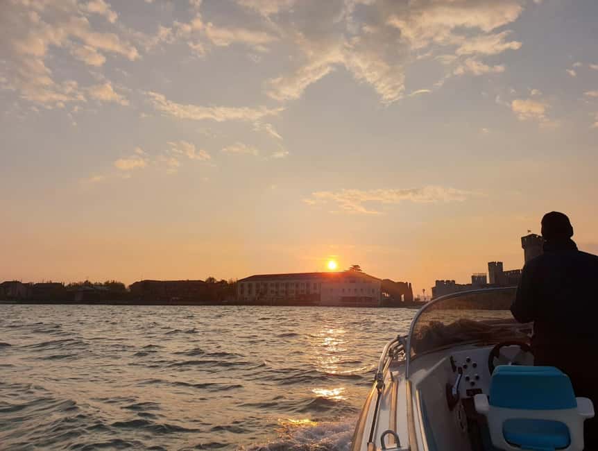 Lake Garda: Sunset Boat Ride from Sirmione - Scenic Views of the Grotte di Catullo and Scaliger Castle