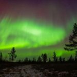 Lapland: Aurora Hunting by Minivan with Guide and Transport - The Charm of Traveling in a Cozy Minivan in Laplands Winter Wilderness
