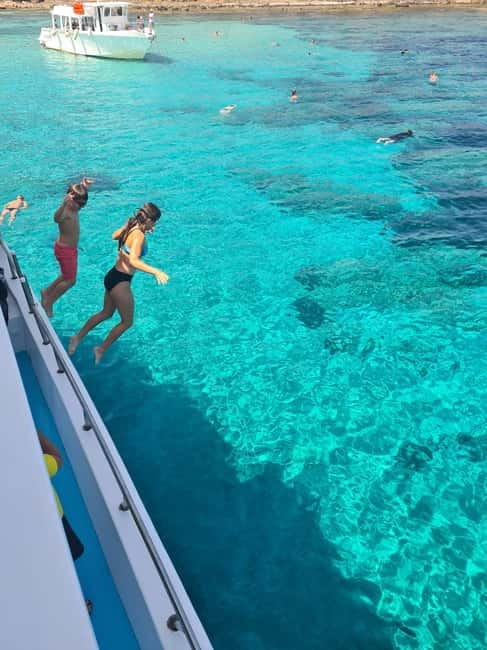 Latsi: Blue Lagoon Boat Trips with Traditional BBQ - The Boat: Comfort, Features, and Fun Additions